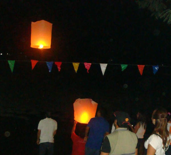 Loy kratong - launching lanterns in Phimai